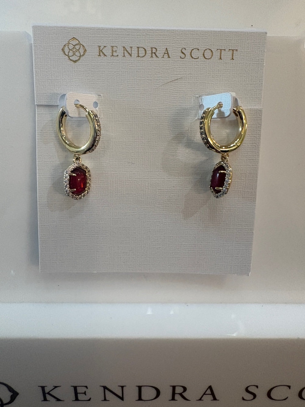 Kendra Scott Daphne Gold Hoop Earrings with Deep Red Gem